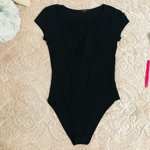 Tops - Black Lace Up Bodysuit. Stretchy. Size Small. Tops - Black Lace Up Bodysuit. Stretchy. Size Small.
